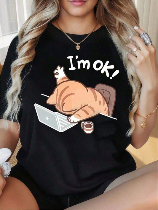 I'm OK Cat Lying On Laptop & Coffee Cup Funny Graphic T-Shirt | Women's Casual Loose Fit Round Neck Short Sleeve Black Summer Top